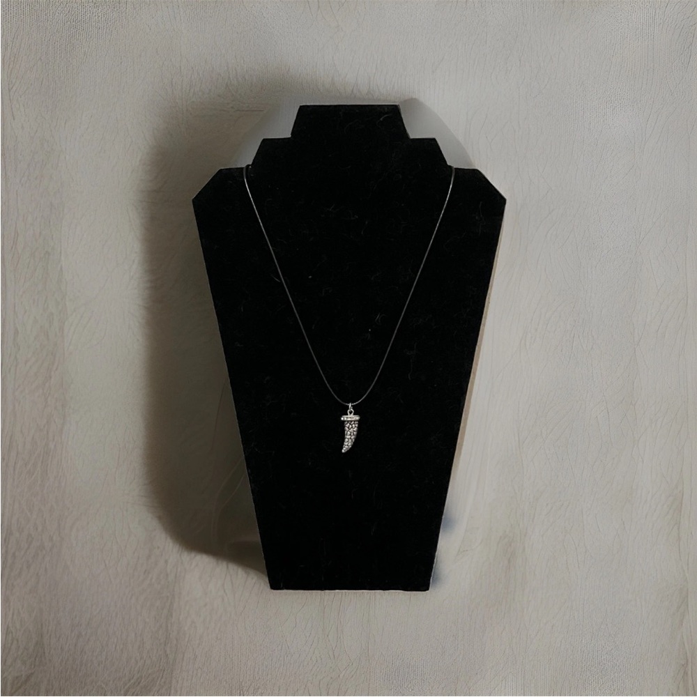 Wicca silver-toned tusk protection pendant Silver toned on black Cord. Witchy.